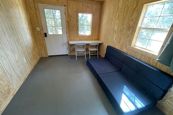 A room with a couch and table in it