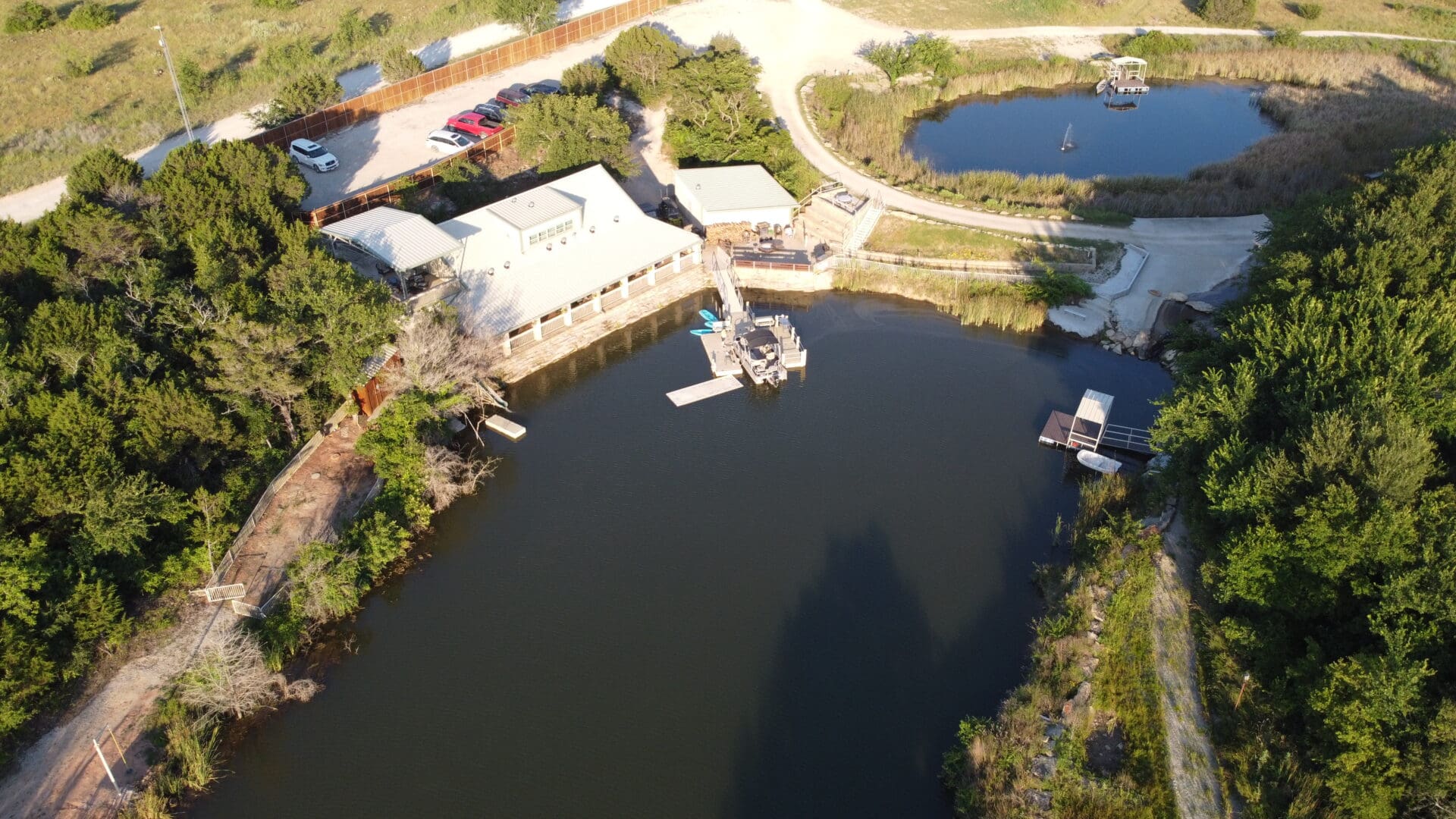 A boat dock with boats parked in it.