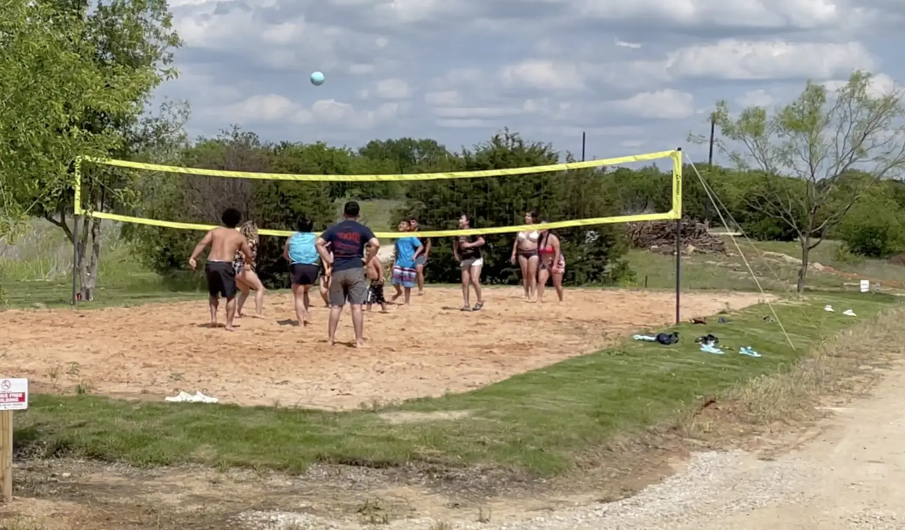 Kids playing volley ball in the outdoor